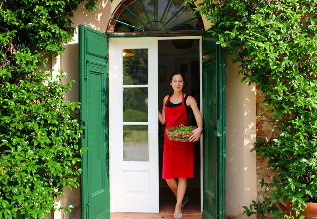Chef Deborah Dal Fovo at her kitchen door in Tuscany